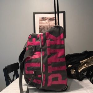 PINK CARRY ON WITH WHEELS